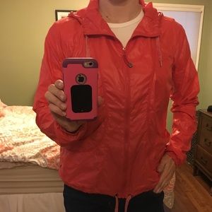 Athleta orange windbreaker. Size M.